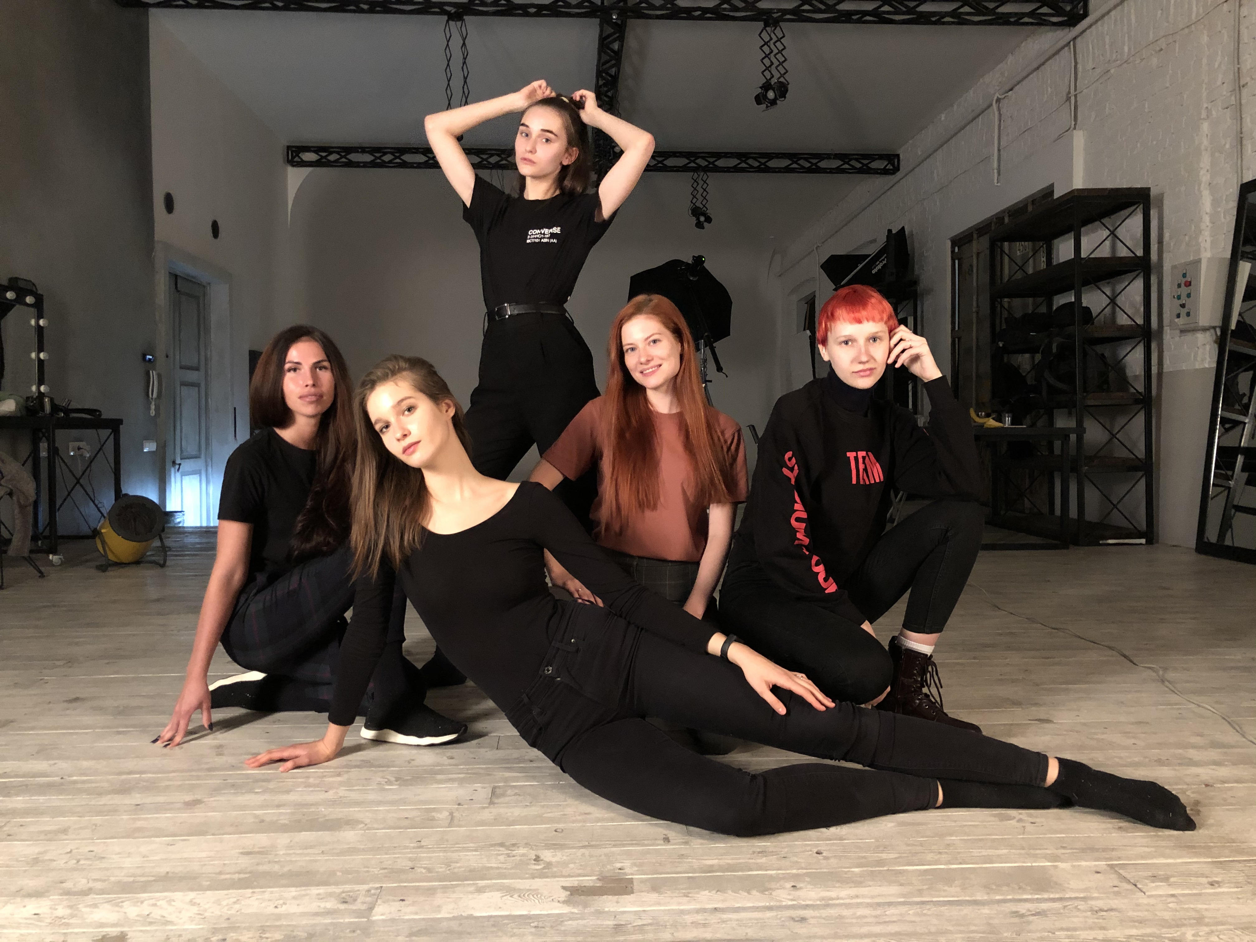 Women sharing an early posing workshop practice in 2019